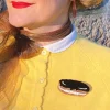 Eclair Au Chocolat Brooch
