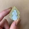 On White Wings Enamel Pin