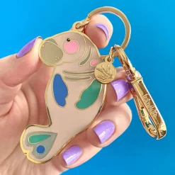 The Dutiful Dugong Enamel Key Ring