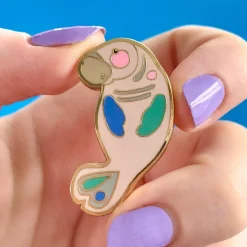 The Dutiful Dugong Enamel Pin